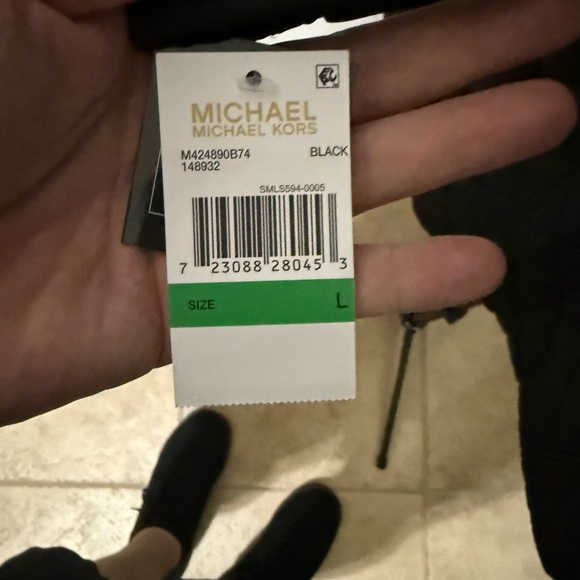 Michael Kors' quilted anorak coat, clever zip-out hood hidden, wing collar. - Picture 10 of 11